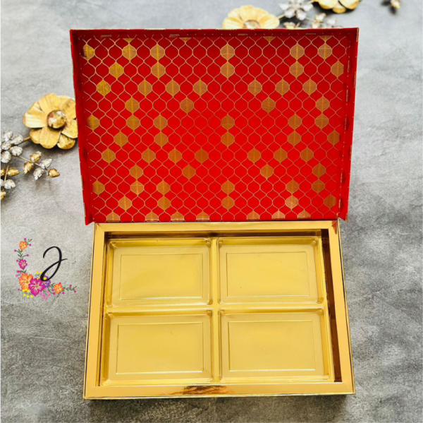 Bookstyle rigid box with festive foiling print.